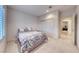Simple bedroom design with a comfortable bed, neutral carpet, and ample closet space at 2850 Thunder Bay Ave, Henderson, NV 89052