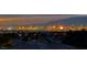 Panoramic view of the Las Vegas skyline at dusk, featuring bright lights from casinos and buildings on the horizon at 2850 Thunder Bay Ave, Henderson, NV 89052