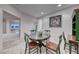 Comfortable dining area showcasing decorative furnishings and seamless transition to living space at 2850 Thunder Bay Ave, Henderson, NV 89052