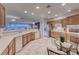 Eat-in kitchen featuring views, ample countertop space, and modern appliances at 2850 Thunder Bay Ave, Henderson, NV 89052