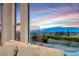 Cityscape views from living room window with lush green landscaping at 2850 Thunder Bay Ave, Henderson, NV 89052