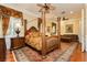 Luxurious main bedroom features hardwood floors, neutral paint, and a sitting area at 2859 Hayden Creek Ter, Henderson, NV 89052