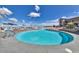 Enjoy this community pool for swimming laps or just relaxing in the sun on comfortable lounge chairs at 2859 Hayden Creek Ter, Henderson, NV 89052