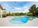 Sparkling backyard pool with water feature, spa, and surrounding lush greenery at 2859 Hayden Creek Ter, Henderson, NV 89052