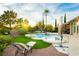 Enjoy the outdoors in this backyard with a sparkling pool and a relaxing lounge chair at 2859 Hayden Creek Ter, Henderson, NV 89052