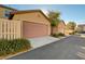 Street view of a home's garage, featuring tidy landscaping and residential charm at 3232 Romanesque Art Ave, Henderson, NV 89044
