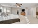 A large and spacious main bedroom with carpet floors and plenty of natural light at 3232 Romanesque Art Ave, Henderson, NV 89044