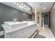 Elegant bathroom with double sinks, a modern shower, and sleek, contemporary design at 3306 Brookfield Dr, Las Vegas, NV 89120