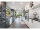 Modern kitchen with stainless steel appliances, dark countertops, and natural light at 3306 Brookfield Dr, Las Vegas, NV 89120