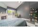 Cozy main bedroom with fireplace, natural light, and minimalist décor at 3306 Brookfield Dr, Las Vegas, NV 89120