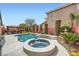 Private backyard featuring a pool, spa, mature landscaping and gazebo for outdoor relaxation and entertaining at 3728 Granada Gorge Ln, North Las Vegas, NV 89084