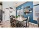 Cozy dining room with a large table and seating for six, custom wall decor at 3728 Granada Gorge Ln, North Las Vegas, NV 89084