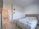 Bedroom with hardwood floors, closet and an open door leading to the foyer at 3783 Canis Minor Ln # 6104, Henderson, NV 89052