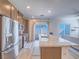 Modern kitchen boasts stainless steel appliances, granite countertops, and light gray cabinets at 3783 Canis Minor Ln # 6104, Henderson, NV 89052