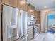 Modern kitchen boasts stainless steel appliances, granite countertops, and light gray cabinets at 3783 Canis Minor Ln # 6104, Henderson, NV 89052