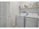 Convenient laundry room with washer, dryer, shelving and ample storage space at 3783 Canis Minor Ln # 6104, Henderson, NV 89052