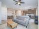 Open-concept living space with modern furnishings, wood floors, and access to the dining area at 3783 Canis Minor Ln # 6104, Henderson, NV 89052
