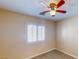 Bedroom with plantation shutters and ceiling fan at 3820 Ice Storm Ct, Las Vegas, NV 89129