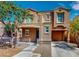 Charming two-story home featuring a cozy front porch and convenient attached garage at 3820 Ice Storm Ct, Las Vegas, NV 89129