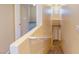 A carpeted staircase with a solid railing offers a safe transition between levels in the home at 3820 Ice Storm Ct, Las Vegas, NV 89129