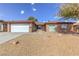 Charming single-story home with a well-maintained front yard and attached garage in a suburban neighborhood at 4000 Twain Ave, Las Vegas, NV 89121