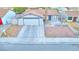 This home has a two car garage and a low maintenance desert landscape at 4145 Plumtree St, Las Vegas, NV 89115