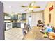 Eat-in kitchen with updated countertops and a sliding glass door to the backyard at 4145 Plumtree St, Las Vegas, NV 89115