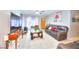 Bright and open living room featuring tile floors and contemporary furnishings at 4145 Plumtree St, Las Vegas, NV 89115