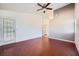 Spacious bedroom features hardwood floors, and access to the exterior of the home at 4620 Standing Bluff Way, Las Vegas, NV 89130