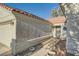 Home featuring a well-maintained yard and a secure front door at 4620 Standing Bluff Way, Las Vegas, NV 89130