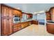 Spacious kitchen features granite counters, stainless steel appliances, and updated cabinets at 4620 Standing Bluff Way, Las Vegas, NV 89130