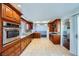 Updated kitchen features granite counters, stainless steel appliances, wood cabinets, and breakfast nook at 4620 Standing Bluff Way, Las Vegas, NV 89130
