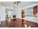 Open concept living room with hardwood floors looking into kitchen at 4620 Standing Bluff Way, Las Vegas, NV 89130