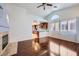 Open concept living room with hardwood floors leading into kitchen at 4620 Standing Bluff Way, Las Vegas, NV 89130