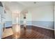 Bright living room with hardwood floors, a modern fireplace and ample natural light at 4620 Standing Bluff Way, Las Vegas, NV 89130