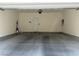 Spacious garage with concrete floor and automatic door opener at 532 Clearsable Ave, Henderson, NV 89044