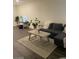 Comfortable living room featuring a neutral color scheme, cozy furniture, and modern decor at 532 Clearsable Ave, Henderson, NV 89044