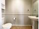 Clean, neutral half-bathroom with classic fixtures and tile floor at 5359 Harvest Breeze Rd, Las Vegas, NV 89118
