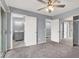 Spacious carpeted bedroom features ensuite bath, mirrored closet and hallway access at 584 Sellers Pl, Henderson, NV 89011
