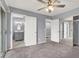Spacious carpeted bedroom features ensuite bath, mirrored closet and hallway access at 584 Sellers Pl, Henderson, NV 89011