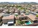 Scenic view of a solar-paneled home in a well-planned suburban neighborhood with desert and mountain views at 648 Sunrise Lake Pl, Henderson, NV 89002