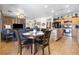 Open living space with a dining area, kitchen, and living room; great for entertaining and relaxing at 648 Sunrise Lake Pl, Henderson, NV 89002