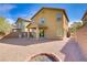 Home featuring a covered patio and easy to maintain yard, complete with desert landscaping and a fire pit at 6480 Chebec St, North Las Vegas, NV 89084