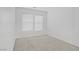 Carpeted bedroom features natural light at 6480 Chebec St, North Las Vegas, NV 89084