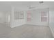 Open-concept living room with view of the front entryway and nearby rooms at 6480 Chebec St, North Las Vegas, NV 89084