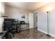 Bedroom featuring wood floors, natural light, and a workspace at 730 Rusty Spur Dr, Henderson, NV 89014