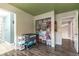 Bedroom with a closet, adjacent bathroom, and hallway access, showcasing an organized layout at 730 Rusty Spur Dr, Henderson, NV 89014
