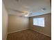 This bedroom features neutral walls, carpet and a ceiling fan at 7564 Durham Hall Ave # 201, Las Vegas, NV 89130