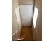 Entryway featuring a white front door, closet, and neutral-toned flooring at 7564 Durham Hall Ave # 201, Las Vegas, NV 89130