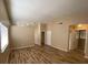 Spacious living room with hardwood floors and ample natural light at 7564 Durham Hall Ave # 201, Las Vegas, NV 89130